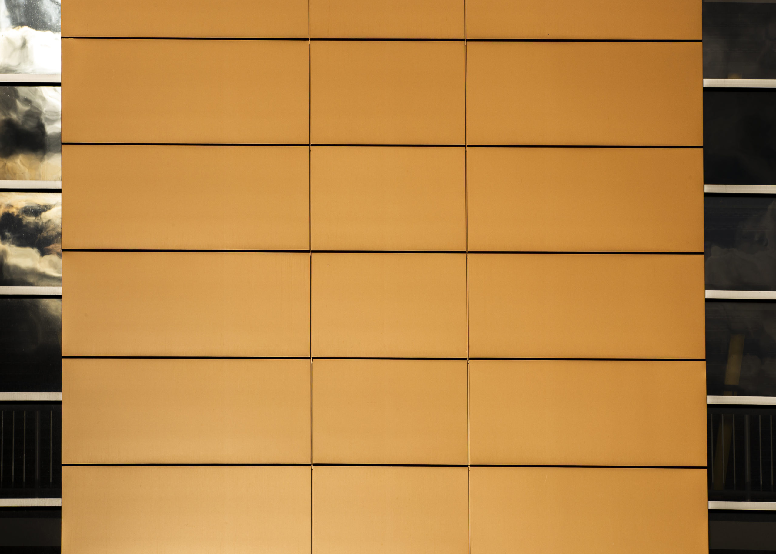 close-up-building-with-neat-surface-windows " Let’s Elevate Your Acoustic Environment"